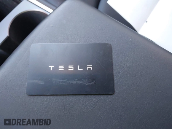 2023 Tesla Model Y Long Range with VIN 7SAYGDEE3PF817097, listed as a IAAI auction lot 41767294 with 64,047 mi miles and . Bid and sale history available at DreamBid. Image 11.