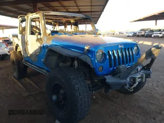2015 Jeep Wrangler Unlimited Sport with VIN 1C4BJWDG5FL676063, listed as a IAAI auction lot 42575365 with Not provided miles and . Bid and sale history available at DreamBid. Image 1.