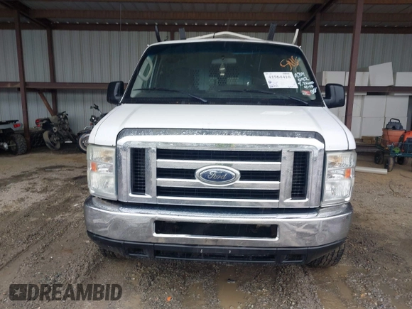 2009 Ford Econoline Cargo with VIN 1FTNE24W99DA34042, listed as a IAAI auction lot 41964410 with 284,031 mi miles and . Bid and sale history available at DreamBid. Image 12.