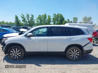 2021 Honda Pilot EX-L z VIN 5FNYF6H51MB058615, wystawiony jako IAAI lot #42657151 z przebiegiem 95 498 mil mil oraz . Historia ofert i sprzedaży dostępna na DreamBid. Obrazek 14.