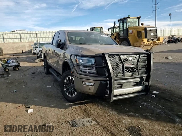 2021 Nissan Titan SV z VIN 1N6AA1FB9MN533034, wystawiony jako Copart lot #81335494 z przebiegiem 71 281 mil mil oraz Szkoda całkowita • Salvage title. Historia ofert i sprzedaży dostępna na DreamBid. Obrazek 11.