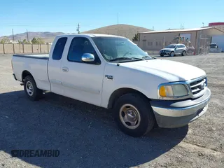 2002 Ford F-150 XL with VIN 1FTRX17W22KE34494, listed as a IAAI auction lot 41689313 with 250,243 mi miles. Bid and sale history available at carsss.com. Image 1.