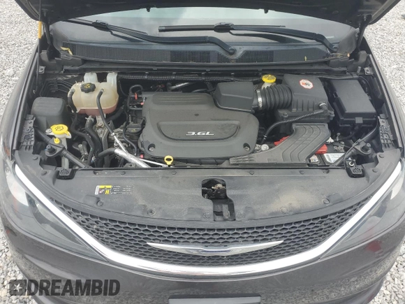 2017 Chrysler Pacifica Touring with VIN 2C4RC1DG8HR676046, listed as a Copart auction lot 57920745 with 100,164 mi miles and Salvage title. Bid and sale history available at DreamBid. Image 12.