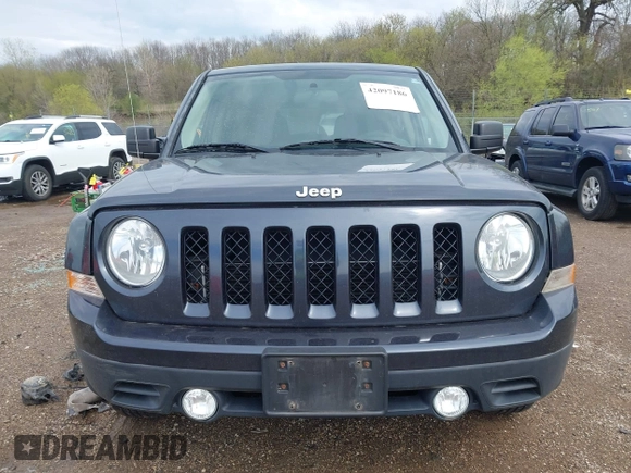 2014 Jeep Patriot Sport with VIN 1C4NJPBB6ED906017, listed as a IAAI auction lot 42097186 with 203,896 mi miles. Bid and sale history available at carsss.com. Image 12.