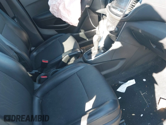 2020 Chevrolet Trax LT with VIN KL7CJLSB0LB029045, listed as a IAAI auction lot 41825272 with 59,149 mi miles and . Bid and sale history available at DreamBid. Image 5.