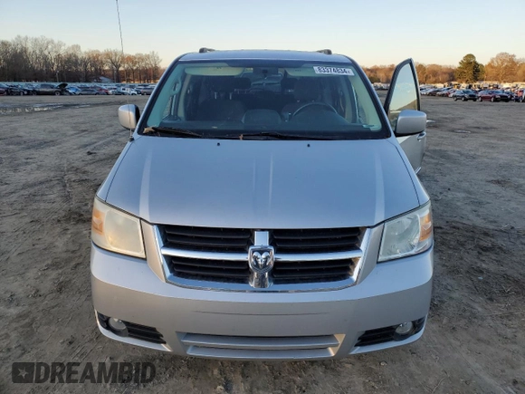 2010 Dodge Grand Caravan SXT with VIN 2D4RN5D16AR496795, listed as a Copart auction lot 83374834 with 99,902 mi miles and Salvage Title. Bid and sale history available at DreamBid. Image 5.