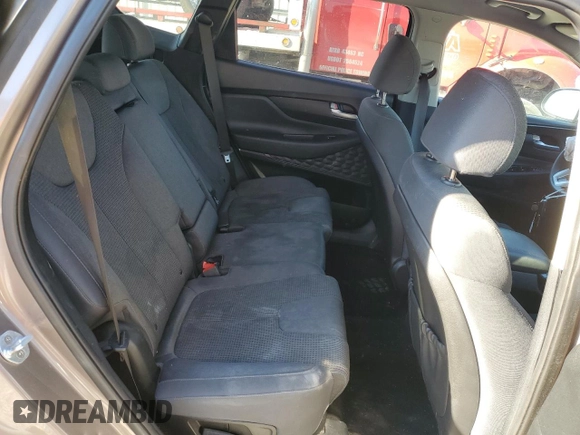 2019 Hyundai Santa Fe SE z VIN 5NMS23AD9KH023222, wystawiony jako Copart lot #86827124 z przebiegiem 129 726 mil mil oraz Szkoda całkowita • Salvage title. Historia ofert i sprzedaży dostępna na DreamBid. Obrazek 12.