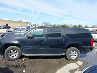2014 GMC Yukon XL SLT with VIN 1GKS2KE77ER199723, listed as a IAAI auction lot 41555112 with 215,436 mi miles. Bid and sale history available at carsss.com. Image 14.
