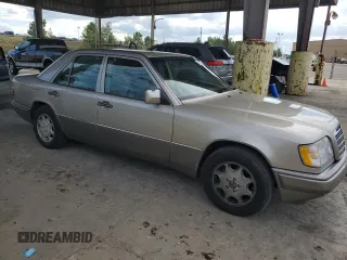 1995 Mercedes-Benz E Class with VIN WDBEA32E4SC269955, listed as a Copart auction lot 72137264 with 218,960 mi miles and Salvage Title. Bid and sale history available at carsss.com. Image 4.