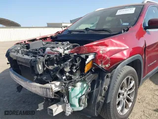 2019 Jeep Cherokee Altitude with VIN 1C4PJLLXXKD120325, listed as a IAAI auction lot 41838643 with 124,315 mi miles. Bid and sale history available at carsss.com. Image 6.