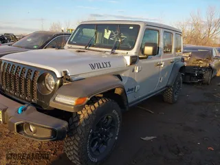 2023 Jeep Wrangler 4xe with VIN 1C4JJXN65PW612855, listed as a IAAI auction lot 41285856 with 11,868 mi miles. Bid and sale history available at carsss.com. Image 17.