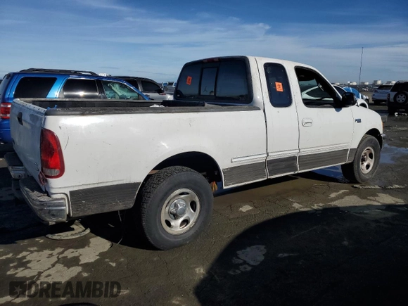 1997 Ford F-150 XL с VIN 1FTEX17L9VKB65855, выставлен на аукционе Copart как лот 87410414 с пробегом 198 005 миль миль и Списание • Salvage title. История ставок и продаж доступна на DreamBid. Изображение 3.