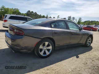 2015 Dodge Charger SXT with VIN 2C3CDXHG8FH794623, listed as a Copart auction lot 52000144 with 145,624 mi miles and Salvage Title. Bid and sale history available at DreamBid. Image 3.