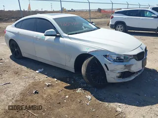 2016 BMW 4 Series 428i with VIN WBA4A9C50GG505299, listed as a IAAI auction lot 41657501 with 89,856 mi miles. Bid and sale history available at carsss.com. Image 1.