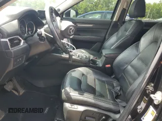 2018 Mazda CX-5 Grand Touring with VIN JM3KFBDM4J0412835, listed as a Copart auction lot 55441315 with 191,968 mi miles and Salvage title. Bid and sale history available at DreamBid. Image 7.