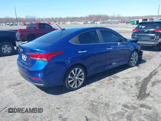 2018 Hyundai Accent Limited with VIN 3KPC34A33JE004671, listed as a IAAI auction lot 41825396 with 69,206 mi miles. Bid and sale history available at carsss.com. Image 4.