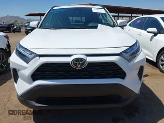 2025 Toyota RAV4 XLE with VIN 2T3W1RFV8SW374059, listed as a IAAI auction lot 42121740 with 7,228 mi miles. Bid and sale history available at carsss.com. Image 12.