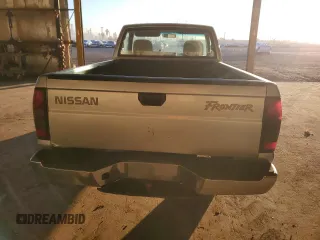 2000 Nissan Frontier XE z VIN 1N6DD21S5YC340513, wystawiony jako Copart lot #89018755 z przebiegiem 237 418 mil mil oraz Szkoda całkowita • Salvage title. Historia ofert i sprzedaży dostępna na DreamBid. Obrazek 6.