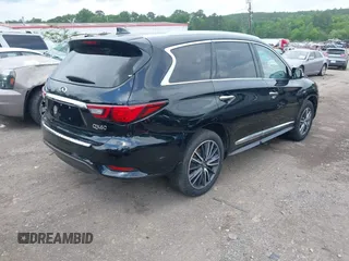 2020 Infiniti QX60 LUXE with VIN 5N1DL0MM8LC516594, listed as a IAAI auction lot 42136299 with 92,747 mi miles. Bid and sale history available at carsss.com. Image 4.