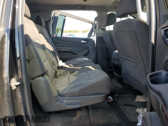 2016 GMC Yukon XL SLE z VIN 1GKS2FKC5GR120867, wystawiony jako Copart lot #74082914 z przebiegiem Nie podano mil oraz Tytuł czysty. Historia ofert i sprzedaży dostępna na DreamBid. Obrazek 11.