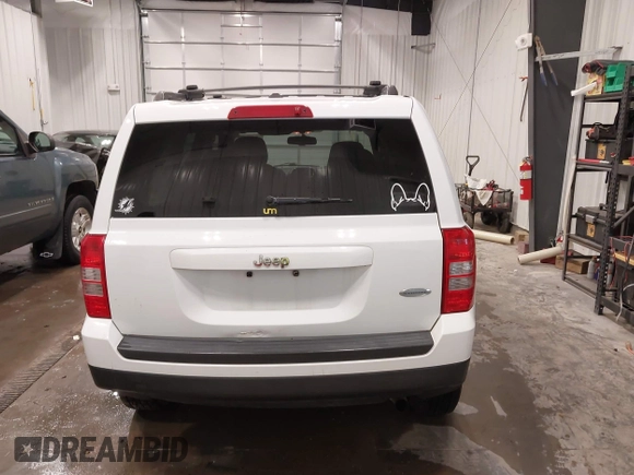 2014 Jeep Patriot Latitude with VIN 1C4NJPFB8ED717749, listed as a IAAI auction lot 41962155 with 147,755 mi miles and . Bid and sale history available at carsss.com. Image 16.