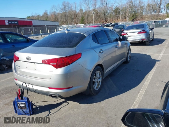 2013 Kia Optima LX with VIN KNAGM4A74D5362733, listed as a IAAI auction lot 41822608 with 134,075 mi miles. Bid and sale history available at carsss.com. Image 4.