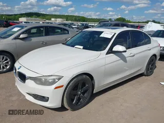2014 BMW 3 Series 328i with VIN WBA3A5C5XEJ463938, listed as a IAAI auction lot 42103330 with 194,263 mi miles and . Bid and sale history available at DreamBid. Image 6.