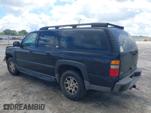 2004 Chevrolet Suburban Z71 z VIN 3GNFK16Z74G158523, wystawiony jako IAAI lot #42495502 z przebiegiem 303 931 mil mil oraz . Historia ofert i sprzedaży dostępna na DreamBid. Obrazek 3.