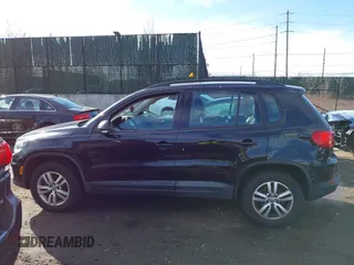 2015 Volkswagen Tiguan SE z VIN WVGAV7AX2FW593453, wystawiony jako IAAI lot #41658359 z przebiegiem 159 619 mil mil oraz . Historia ofert i sprzedaży dostępna na DreamBid. Obrazek 14.