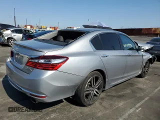 2017 Honda Accord Touring with VIN 1HGCR3F91HA016581, listed as a Copart auction lot 60517085 with 99,182 mi miles and Salvage title. Bid and sale history available at DreamBid. Image 3.