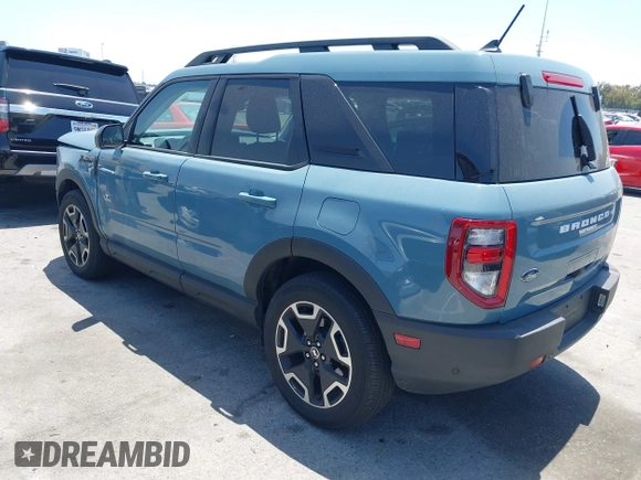 2023 Ford Bronco Sport Outer Banks z VIN 3FMCR9C62PRD61985, wystawiony jako IAAI lot #42304591 z przebiegiem 18 879 mil mil oraz . Historia ofert i sprzedaży dostępna na DreamBid. Obrazek 3.