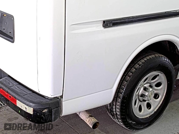 2012 Chevrolet Express Cargo z VIN 1GCSGAFX8C1135353, wystawiony jako IAAI lot #42610415 z przebiegiem 143 913 mil mil oraz . Historia ofert i sprzedaży dostępna na DreamBid. Obrazek 26.