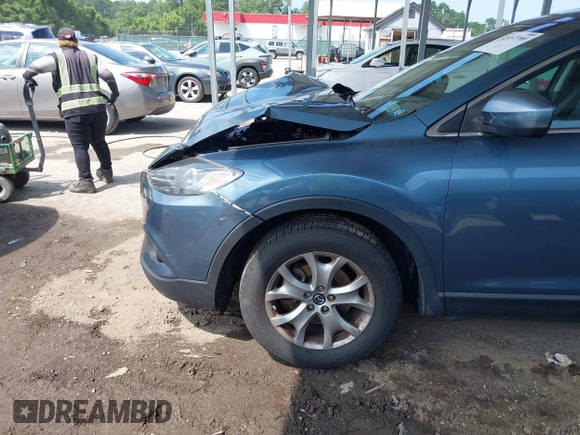 2014 Mazda CX-9 Touring with VIN JM3TB3CV7E0440747, listed as a IAAI auction lot 42457709 with 166,588 mi miles and . Bid and sale history available at DreamBid. Image 18.
