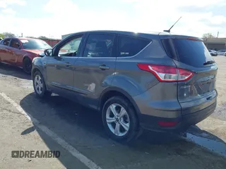 2014 Ford Escape SE with VIN 1FMCU9G96EUA06567, listed as a IAAI auction lot 41954345 with 88,294 mi miles and . Bid and sale history available at DreamBid. Image 3.