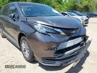 2021 Toyota Sienna LE with VIN 5TDKSKFC4MS004345, listed as a IAAI auction lot 42145140 with 103,544 mi miles and . Bid and sale history available at DreamBid. Image 17.