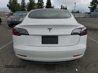2021 Tesla Model 3 Standard Range Plus with VIN 5YJ3E1EA6MF066064, listed as a Copart auction lot 54063625 with 27,424 mi miles and Salvage Title. Bid and sale history available at DreamBid. Image 6.