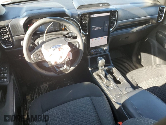 2024 Ford Ranger XLT with VIN 1FTER4HHXRLE20468, listed as a Copart auction lot 79519994 with 9,386 mi miles and Salvage title. Bid and sale history available at DreamBid. Image 8.
