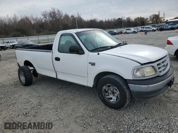 1999 Ford F-150 with VIN 1FTRF17W1XNA20017, listed as a Copart auction lot 84550234 with Not provided miles and Salvage title. Bid and sale history available at DreamBid. Image 4.