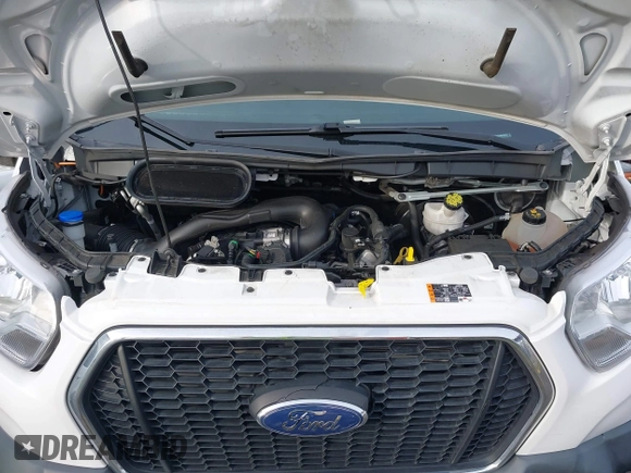2021 Ford Transit Cargo with VIN 1FTBR1Y81MKA25014, listed as a IAAI auction lot 41594717 with 49,983 mi miles and . Bid and sale history available at DreamBid. Image 10.
