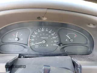 1999 Ford Escort SE z VIN 1FAFP13P5XW268897, wystawiony jako IAAI lot #42844258 z przebiegiem 169 050 mil mil oraz . Historia ofert i sprzedaży dostępna na DreamBid. Obrazek 7.