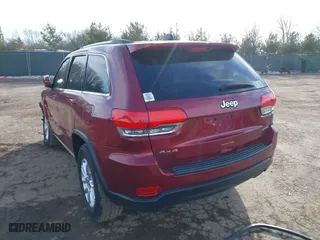 2015 Jeep Grand Cherokee Altitude with VIN 1C4RJFAG4FC626130, listed as a IAAI auction lot 41405767 with 131,069 mi miles. Bid and sale history available at carsss.com. Image 3.