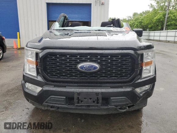 2021 Ford F-150 XL with VIN 1FTEW1EP2MFA19832, listed as a Copart auction lot 57981895 with 66,766 mi miles and Salvage title. Bid and sale history available at DreamBid. Image 5.