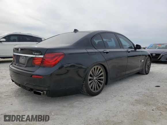 2015 BMW 7 Series 740i with VIN WBAYA6C50FD826727, listed as a Copart auction lot 82197433 with 241,799 mi miles and . Bid and sale history available at DreamBid. Image 3.