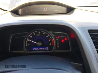 2006 Honda Civic LX with VIN 1HGFA16596L060058, listed as a IAAI auction lot 41959725 with 125,853 mi miles and . Bid and sale history available at DreamBid. Image 7.