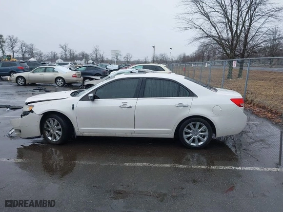 2012 Lincoln MKZ with VIN 3LNHL2JCXCR813912, listed as a IAAI auction lot 41560299 with 153,806 mi miles. Bid and sale history available at carsss.com. Image 14.