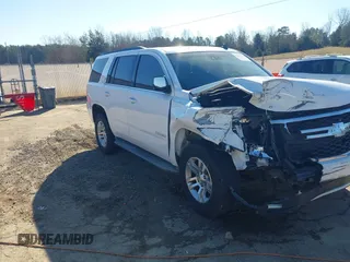 2015 Chevrolet Tahoe LT with VIN 1GNSCBKC0FR104096, listed as a IAAI auction lot 41679298 with 231,005 mi miles and . Bid and sale history available at DreamBid. Image 17.
