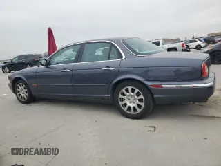 2004 Jaguar XJ with VIN SAJWA71C04SG22878, listed as a Copart auction lot 44383205 with 127,515 mi miles and Clean Title. Bid and sale history available at carsss.com. Image 2.