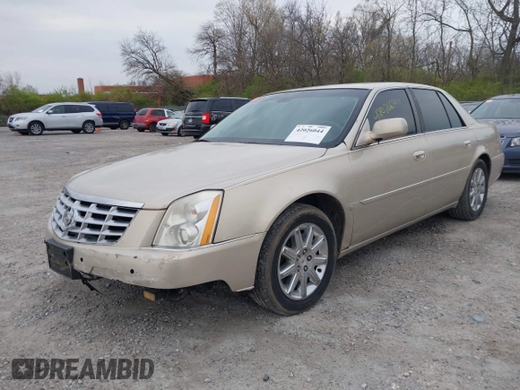 2009 Cadillac DTS w/1SA with VIN 1G6KD57Y29U137410, listed as a IAAI auction lot 42026044 with 112,916 mi miles. Bid and sale history available at carsss.com. Image 2.