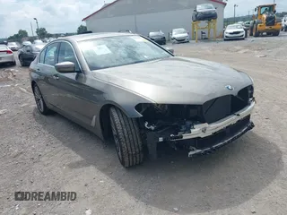 2018 BMW 5 Series 530i xDrive with VIN WBAJA7C55JG909519, listed as a IAAI auction lot 42650263 with 57,077 mi miles and . Bid and sale history available at DreamBid. Image 1.