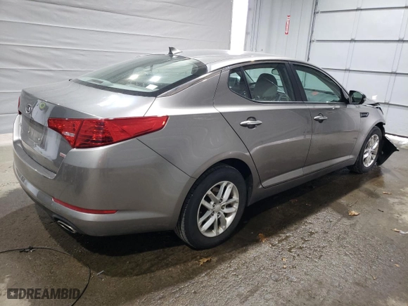 2012 Kia Optima LX with VIN 5XXGM4A72CG067613, listed as a Copart auction lot 49129575 with 105,597 mi miles and Salvage Title. Bid and sale history available at carsss.com. Image 3.